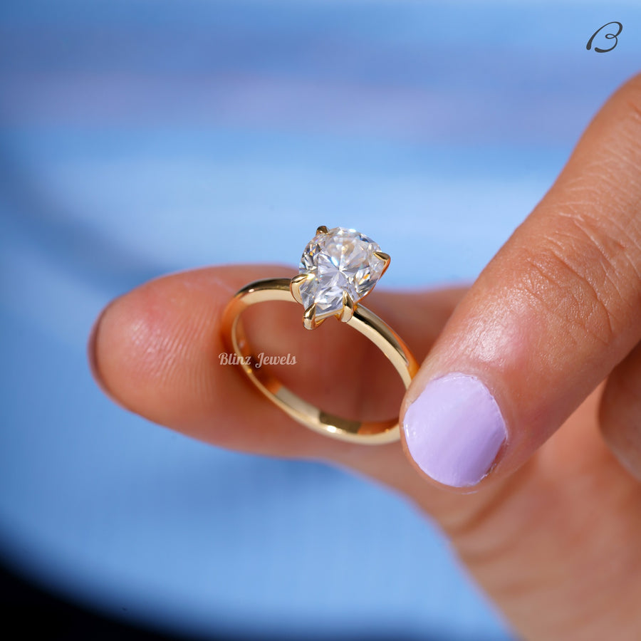 Pear Cut Colorless Moissanite Solitaire Diamond Engagement Ring