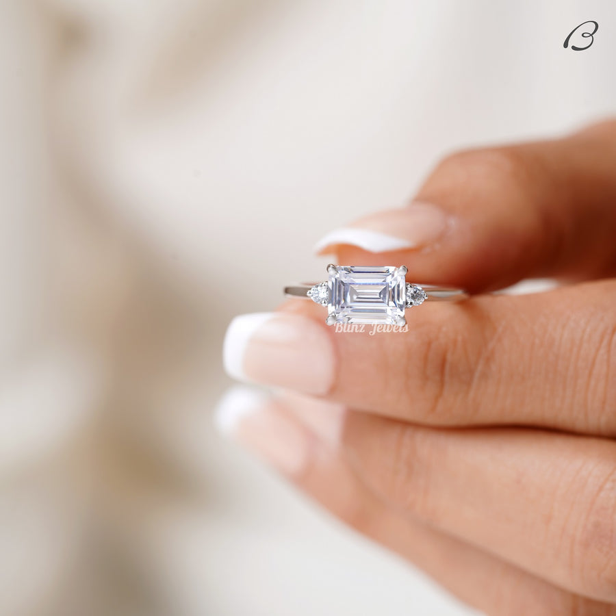 East West Emerald Cut Moissanite Three Stone Engagement Ring