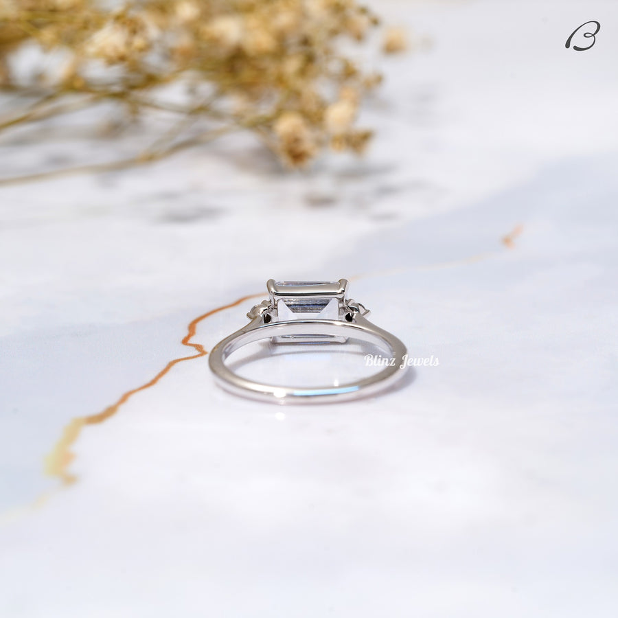 East West Emerald Cut Moissanite Three Stone Engagement Ring