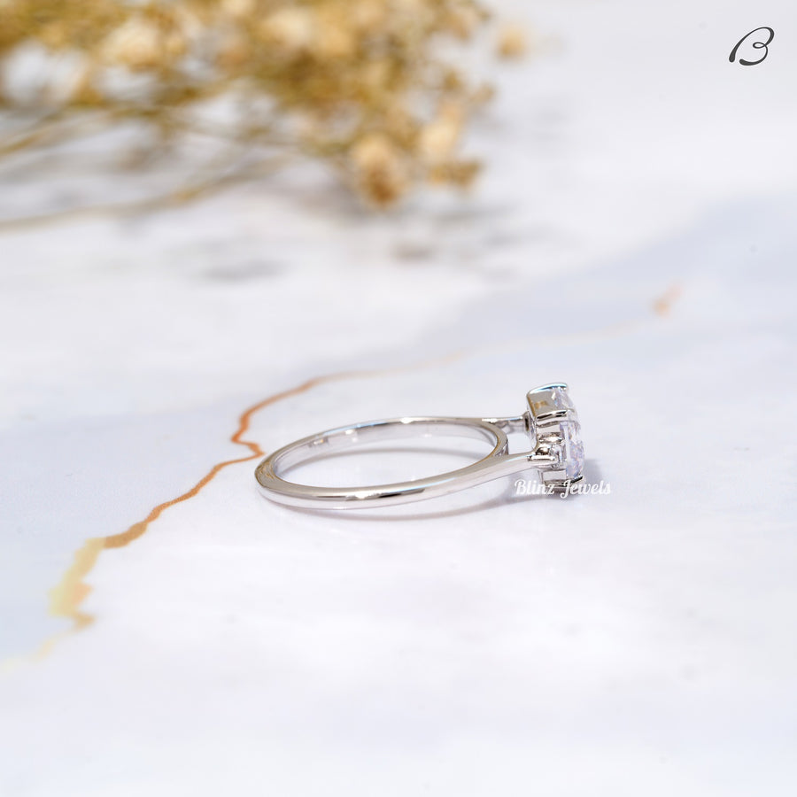 East West Emerald Cut Moissanite Three Stone Engagement Ring