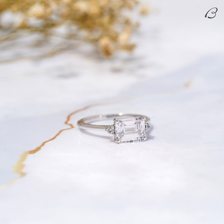 East West Emerald Cut Moissanite Three Stone Engagement Ring