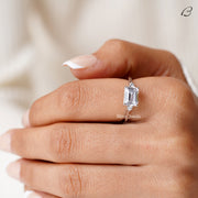 East West Emerald Cut Moissanite Three Stone Engagement Ring