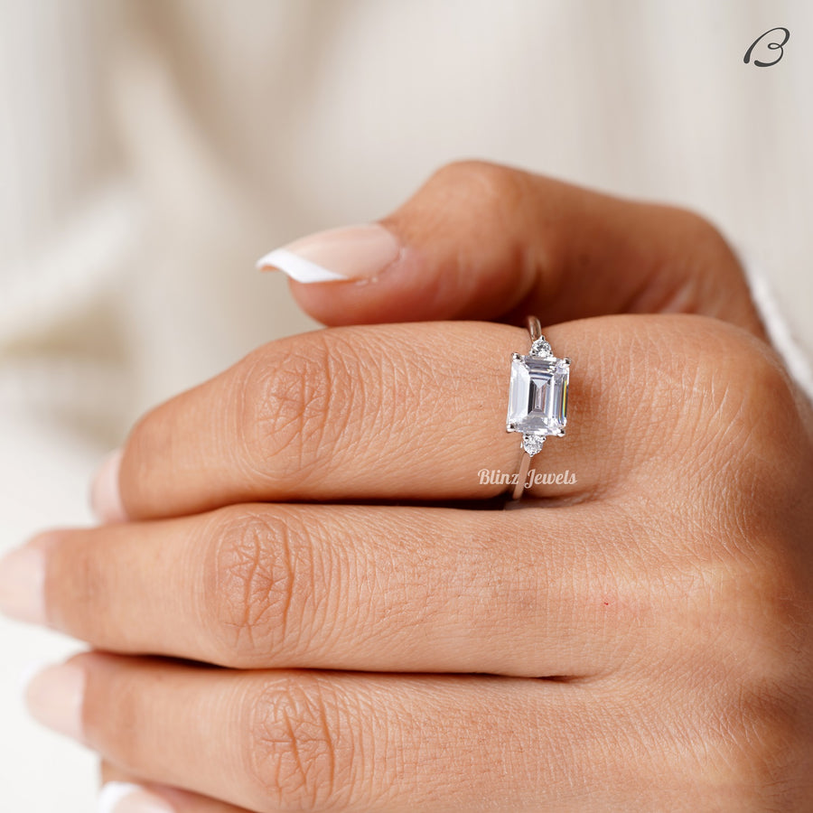 East West Emerald Cut Moissanite Three Stone Engagement Ring