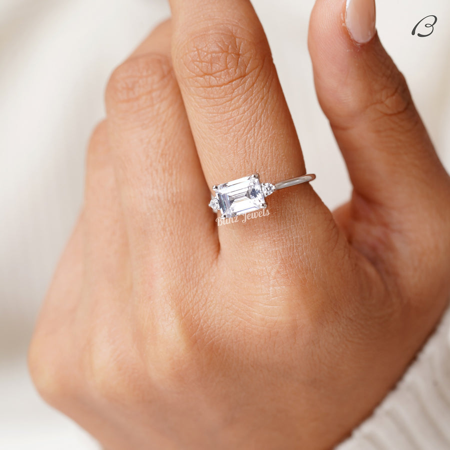 East West Emerald Cut Moissanite Three Stone Engagement Ring
