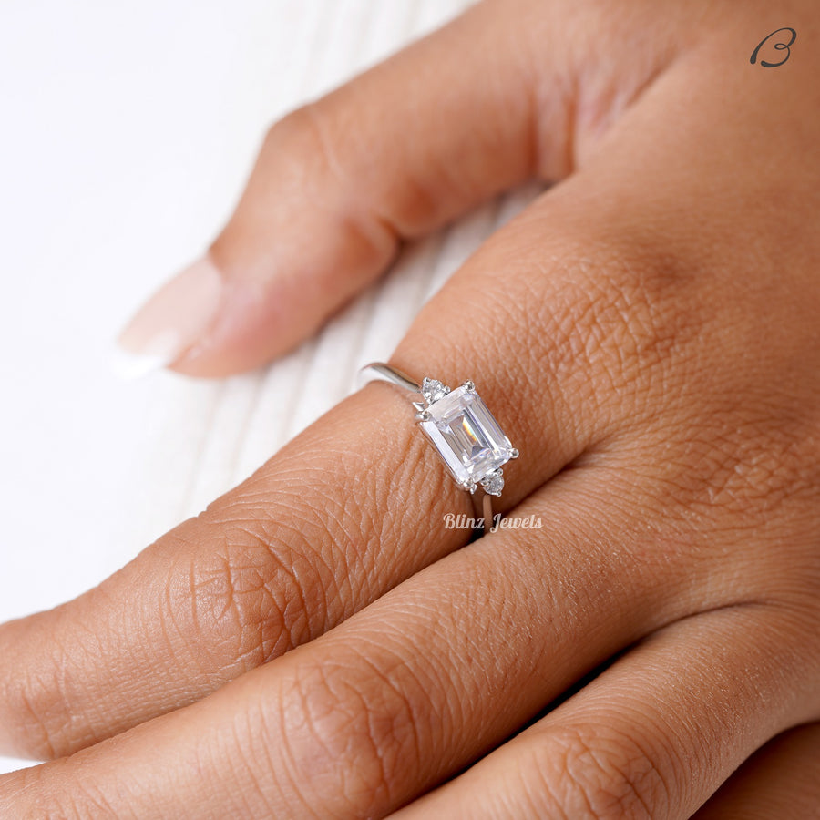 East West Emerald Cut Moissanite Three Stone Engagement Ring